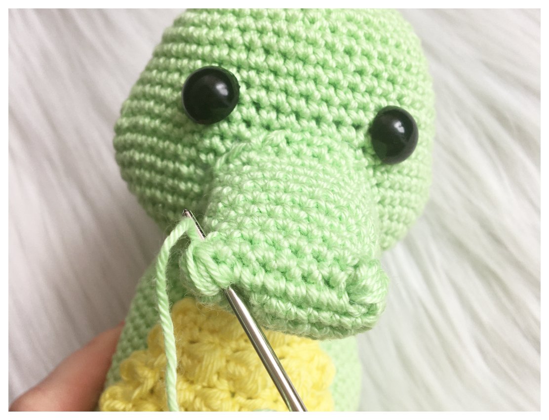 Blog-Inhaltsbild für 'Krokodino Konrad, kostenlose Häkelanleitung'